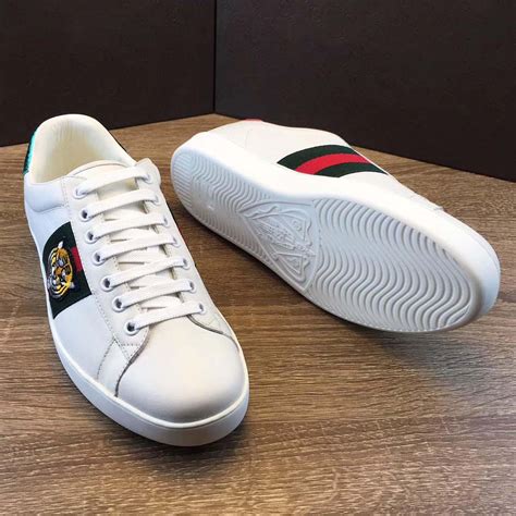 tenis gucci masculino branco|gucci embroidered sneakers.